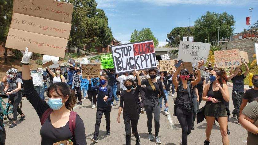 Young protesters, including many San Diego-area high school and college students, marched through Balboa Park