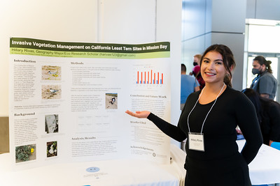 geography student presenting trifold project